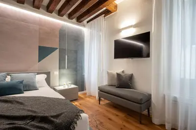Letto o letti in una camera di Sant'Angelo Apartment by Wonderful Italy