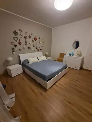 Letto o letti in una camera di Casa Gina & Jeto