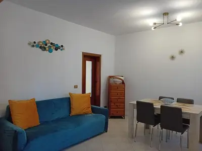 Area soggiorno di CORTE Apartment