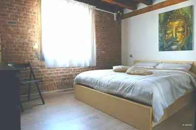 Letto o letti in una camera di Vivi Vicenza