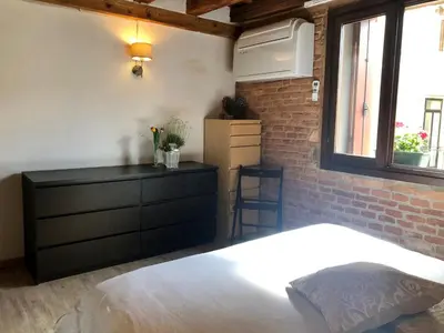 Letto o letti in una camera di Vivi Vicenza