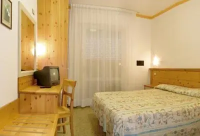 Letto o letti in una camera di Hotel Nelson