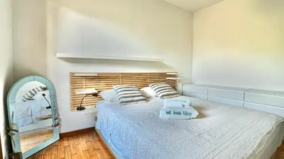 Letto o letti in una camera di Golf Jesolo Venice
