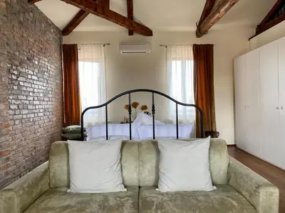 Letto o letti in una camera di DUOMO Murano Apartment with Canal view