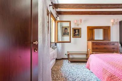 Letto o letti in una camera di Vivaldi