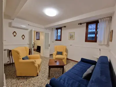 Area soggiorno di Veneziacentopercento Apartments & Rooms