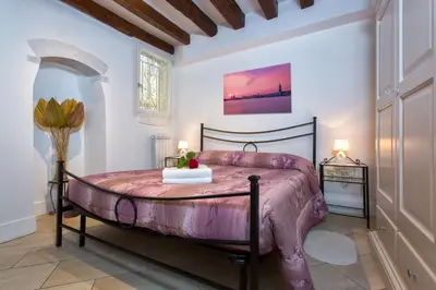 Letto o letti in una camera di Biennale Ca Dario