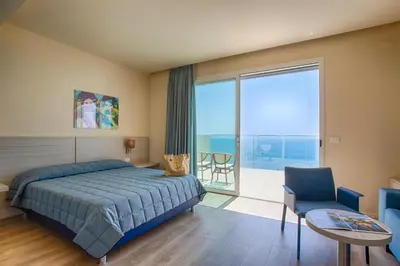 Letto o letti in una camera di Hotel Ancora