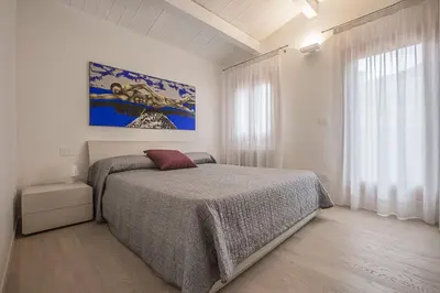 Letto o letti in una camera di Ca' Rossini 2