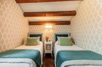 Letto o letti in una camera di Ca' Della Luce Terrace in San Marco