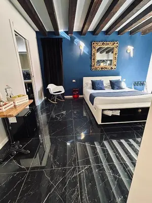 Letto o letti in una camera di Dimora Fattorini