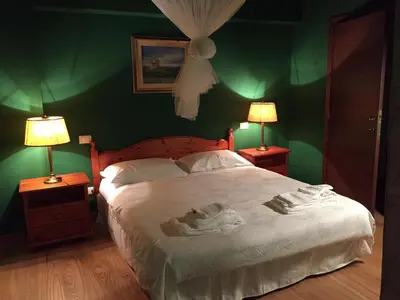 Letto o letti in una camera di Podere di Costabella