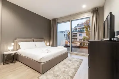 Letto o letti in una camera di JOIVY Treviso Vittoria