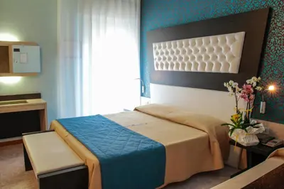 Letto o letti in una camera di Hotel Hollywood***S