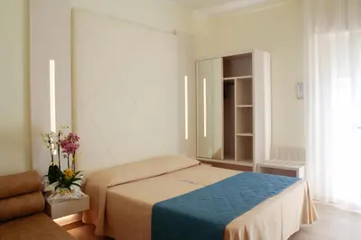Letto o letti in una camera di Hotel Hollywood***S