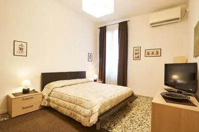 Letto o letti in una camera di Le Tango