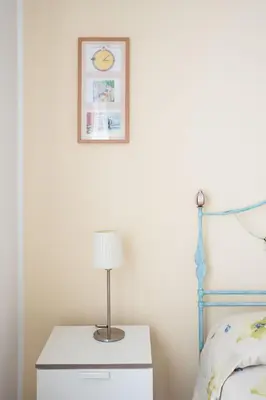 Letto o letti in una camera di B&B BrentaGiardino