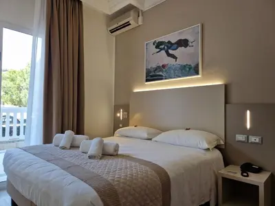 Letto o letti in una camera di Hotel Danubio