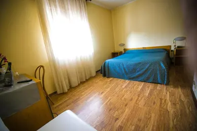 Letto o letti in una camera di Hotel Agli Olmi