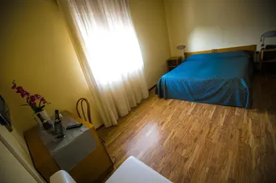 Letto o letti in una camera di Hotel Agli Olmi