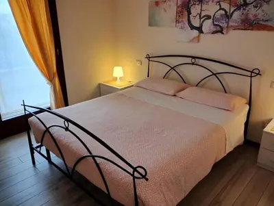 Letto o letti in una camera di Appartamento Le Rose
