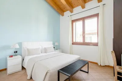 Letto o letti in una camera di Agriturismo Ai Carpini