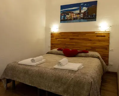 Letto o letti in una camera di Ca' del Megio