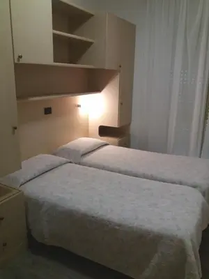 Letto o letti in una camera di Hotel Christian