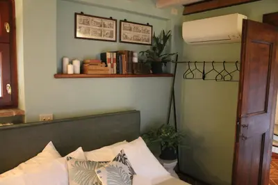 Letto o letti in una camera di Little Garden
