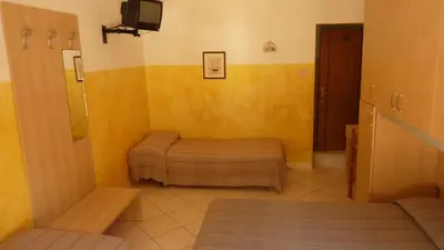 Letto o letti in una camera di Hotel Canova