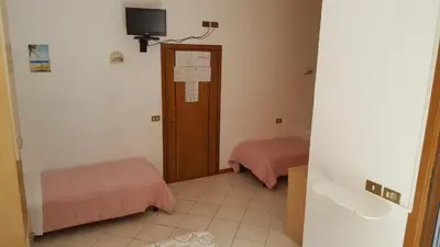 Letto o letti in una camera di Hotel Canova