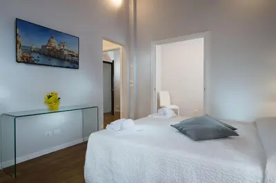Letto o letti in una camera di Ca' Giusta