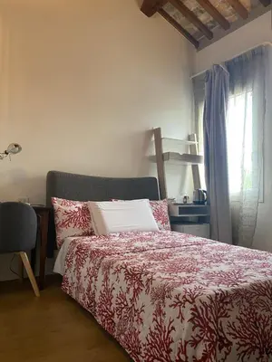 Letto o letti in una camera di A casa di V-Ale