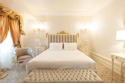 Letto o letti in una camera di Ca' Bonfadini Historic Experience