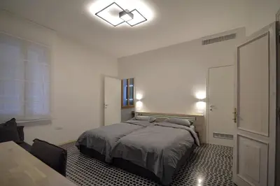 Letto o letti in una camera di Carbonaia Venezia