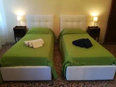 Letto o letti in una camera di Residenza Ca Trinità