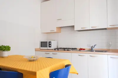 Cucina o angolo cottura di Casa Lucia Centro Apartment Deluxe