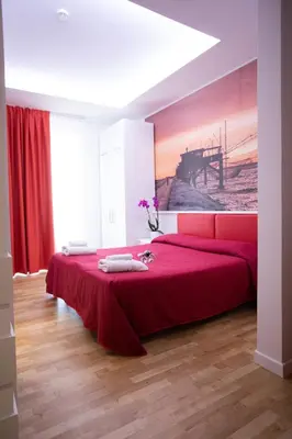 Letto o letti in una camera di Hotel Ragno D'Oro