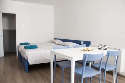 Letto o letti in una camera di Ingrappa Sporthouse
