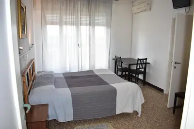 Letto o letti in una camera di Appartamento Paola