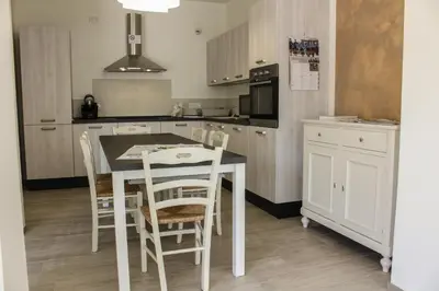 Cucina o angolo cottura di B&B L'arte è di casa