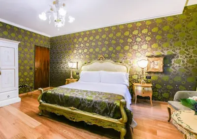 Letto o letti in una camera di Ai Cherubini