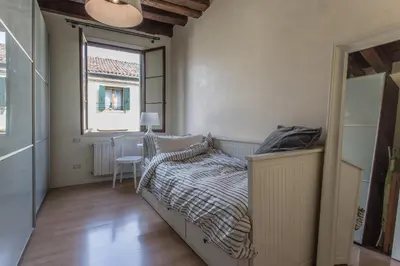 Letto o letti in una camera di Casa Tadi Padova Centro