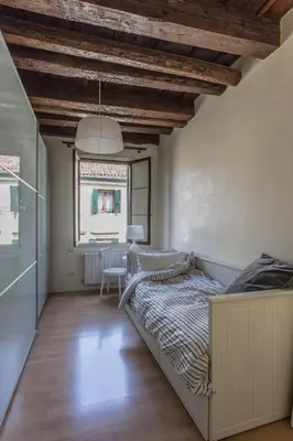 Letto o letti in una camera di Casa Tadi Padova Centro