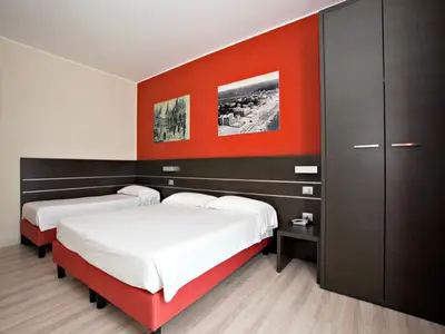 Letto o letti in una camera di Hotel Vienna
