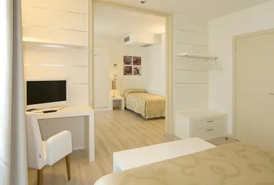 Letto o letti in una camera di Hotel Vienna