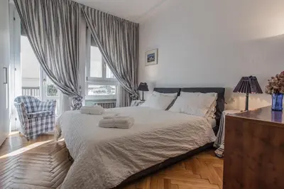 Letto o letti in una camera di Corso del Popolo Suite by Welc(H)ome