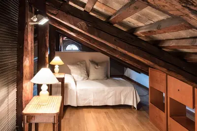 Letto o letti in una camera di Ca' Navagero Apartments