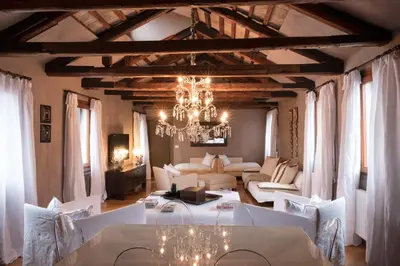 Letto o letti in una camera di Ca' Navagero Apartments