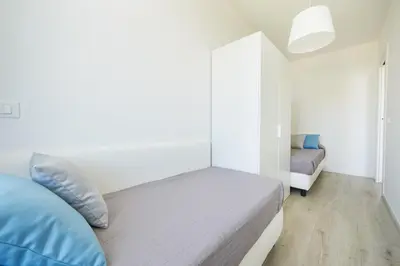 Letto o letti in una camera di Palms Apartments